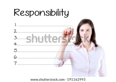 Business woman writing responsibility list in blank. 