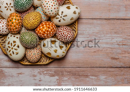 Colorful Easter Egg banner.Above view with copy space.Happy Easter decoration background,colorful hand painted decorated eggs.Festive tradition for Eastern European countries.Holiday Still life photo 