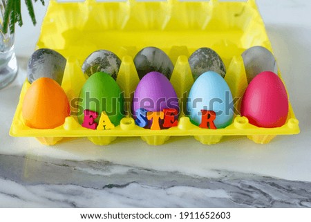 Letters Easter Background Colored Eggs. Postcard. Family Tradition Concept. Selective focus
