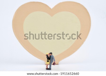 miniature of lovers with a colorful heart