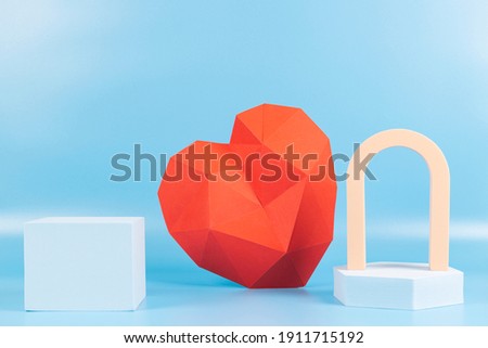 Abstract composition with geometric shapes forms and polygonal heart. Exhibition podium, platform for product presentation on light blue background. Valentines day background