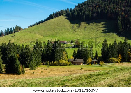 Hiking in autumn scenic panoramic view over alps