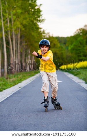One young boy rollerblading outdoor