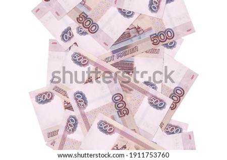 500 russian rubles bills flying down isolated on white. Many banknotes falling with white copy space on left and right side