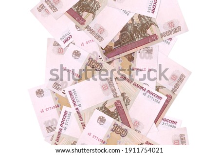 100 russian rubles bills flying down isolated on white. Many banknotes falling with white copy space on left and right side