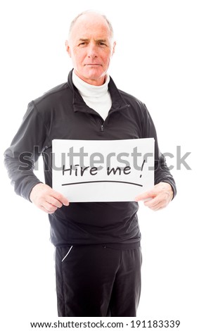 Senior man holding a message board with the text words "Hire me"