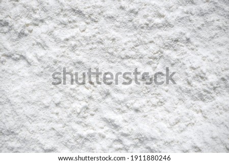 Abstract white background. Powder surface texture. Macro. Royalty-Free Stock Photo #1911880246