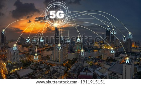 5G technology with Computer Network connection line between building over Panorama of Bangkok cityscape river side Modern building at Fantastic twilight time, Connectivity and global networks concept Royalty-Free Stock Photo #1911915151