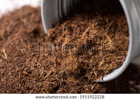 Coco peat for gardening. Coco peat is growing medium made out of coconut husk. Royalty-Free Stock Photo #1911922228