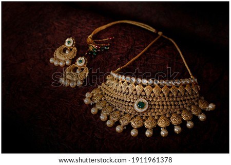 latest Indian gold Necklace Jewelry  Royalty-Free Stock Photo #1911961378