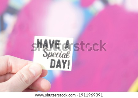 Conceptual photo. Positive message. Card with the phrase: have a special day.
