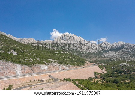 Aerial view of limestone mountain peak Tulove Grede near Dalmatia in Croatia