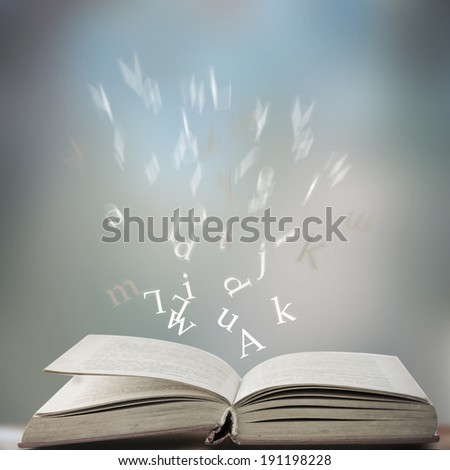 open book with letters