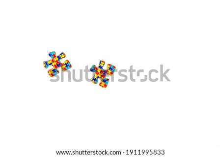 Autism awareness symbols - two pieces of puzzle. World Autism spectrum disorder Awareness Day, pride, jigsaw. White background. Copy space