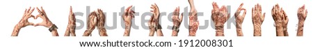 Beautiful female hands with henna tattoo on white background Royalty-Free Stock Photo #1912008301