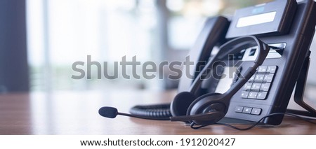 Communication support, call center and customer service help desk. VOIP headset for customer service support (call center) concept Royalty-Free Stock Photo #1912020427