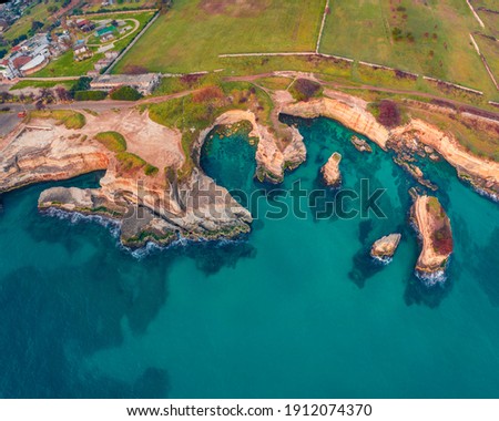 Aerial landscape photography. Straight-down view from flying drone of popular tourist attraction - Torre Sant'Andrea. Wonderful morning seascape of Adriatic sea, Apulia region, Italy, Europe.