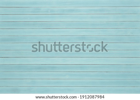 Light blue painted wooden planks texture background