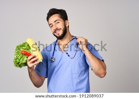 male doctor with food in hands nutritionist healthy food