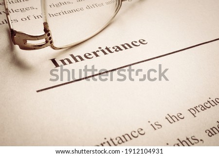 Legal inheritance word on the page about last will. Royalty-Free Stock Photo #1912104931