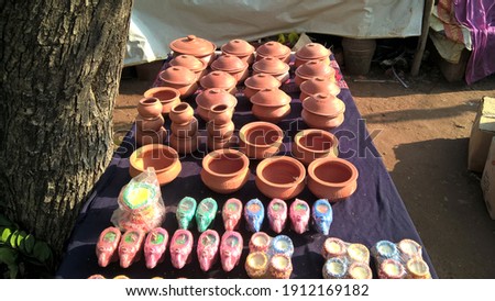 stocked decorated earthen pots for multipurpose use