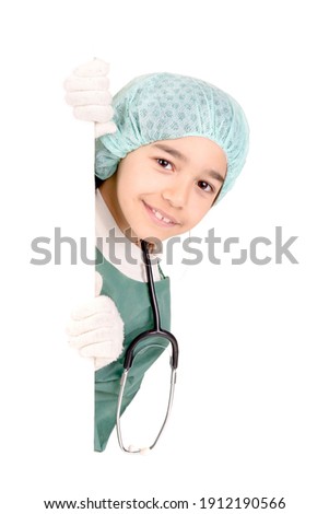 little girl dressed as a doctor isolated in white