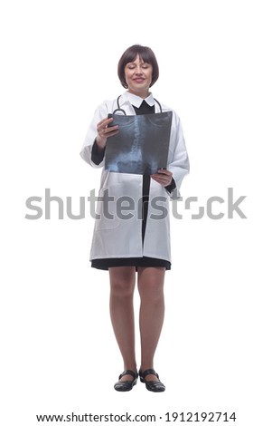 smiling woman doctor with an x-ray. isolated on a white background.