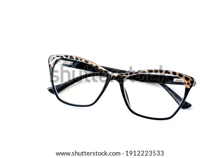 Eyeglasses with animal print design frame isolated on white 