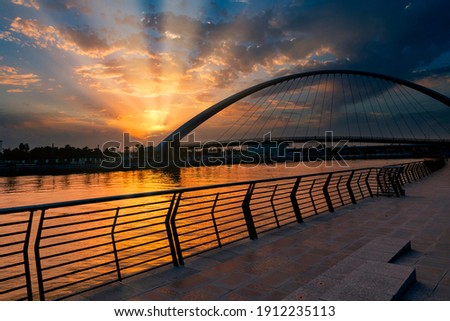 Tolerance Bridge Dubai during golden hour or sunset. Famous Tourist Attraction best place to visit in holidays modern architecture design. Royalty-Free Stock Photo #1912235113