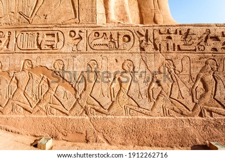 Egyptian relief of defeated and enslaved enemies at the temple of Abu Simbel, Egypt