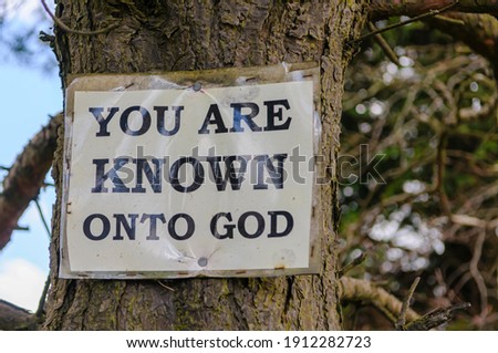 Religious sign typical of many erected in rural Protestant areas of Northern Ireland. "You are known onto God"