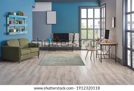 Modern television room, blue background, bookshelf on the wall, furniture green and grey sofa, carpet and middle table decoration, interior style.