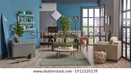 Blue and grey wall background green furniture sofa and armchair, working table background, poster wooden bookshelf, interior room design.