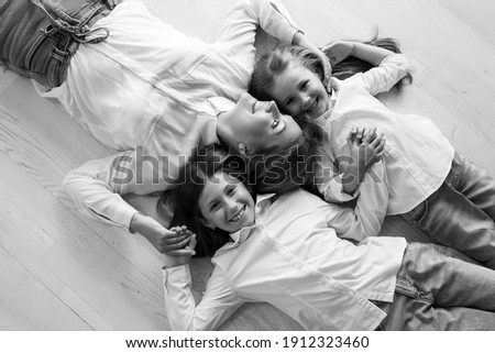 Mother child black white. Woman with child black and white photo. High quality photo