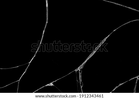 Close-up wrinkles and cracks LCD screen display of smartphone or tablet from smash and fall bumps, detail pattern and background Royalty-Free Stock Photo #1912343461