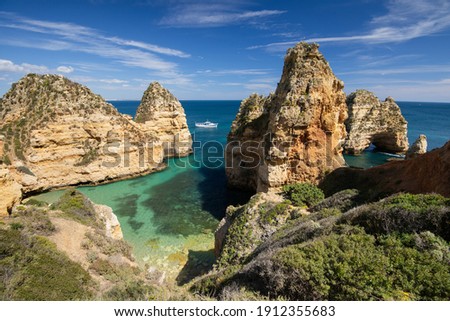 Bay near Lagos town, Algarve region, Portugal. Travel, landmark, holiday, vacations concept Royalty-Free Stock Photo #1912355683