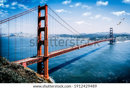 The Golden Gate Bridge is a suspension bridge located in the western United States in the state of California. The bridge connects San Francisco with Sausalito Royalty-Free Stock Photo #1912429489