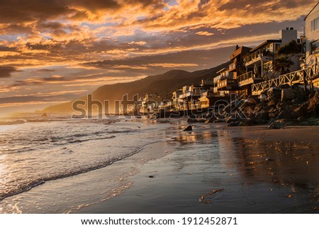 Sunset view of Topanga beach in scenic Malibu, California. Royalty-Free Stock Photo #1912452871