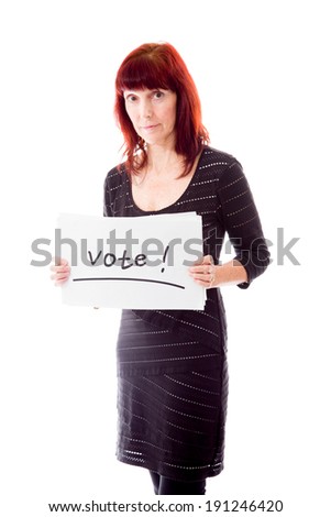Mature woman showing vote sign on white background