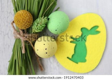 Easter, Easter card, holiday, picture with Easter bunny, eggs and green grass, Easter symbol