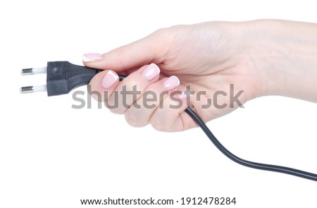 Plug in hand on white background isolation