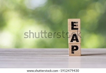 Cube block with the inscription EAP. Employee assistance program EAP symbol. Royalty-Free Stock Photo #1912479430