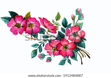 Embroidered bouquet of flowers on white fabric, Ukrainian folk embroidery  Royalty-Free Stock Photo #1912484887
