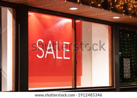 Shop Window With Sale Sign. Night city. Shopping theme.