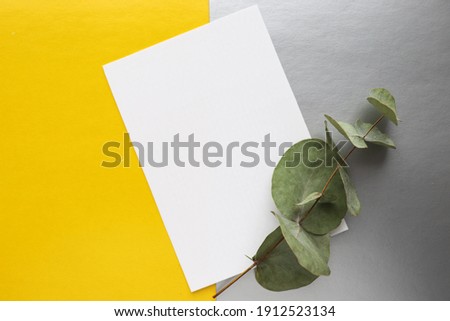 postcard mockup. white envelope on a gray and yellow background. invitation 