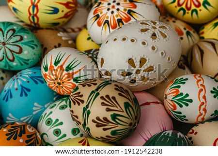 Happy Easter.Colorful hand painted decorated Easter eggs. Handmade Easter craft.Spring decoration background. Festive tradition for Eastern European countries.Holiday Still life photo selective focus 