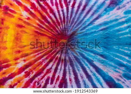 Fashionable Retro Abstract Psychedelic Tie Dye Sunrise Swirl Design.
