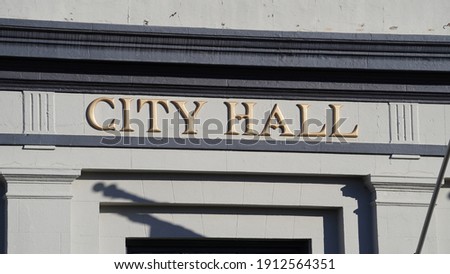 Close up of City Hall words on building