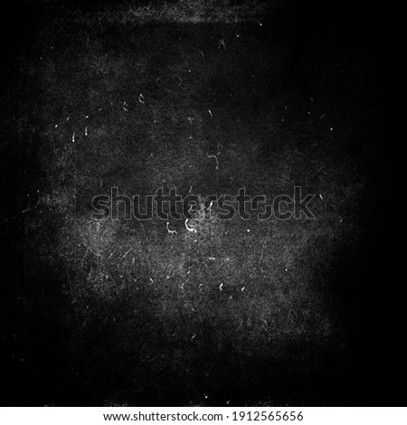 Black grunge scratched background, old film effect, distressed texture