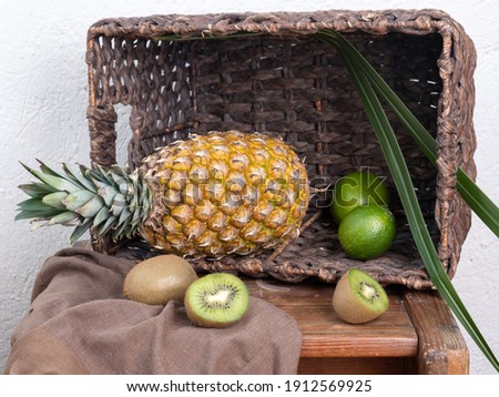 Pine apple and limes still life
